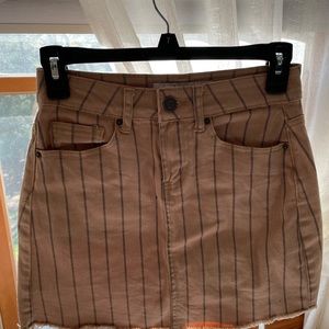 tan mini skirt with black stripes